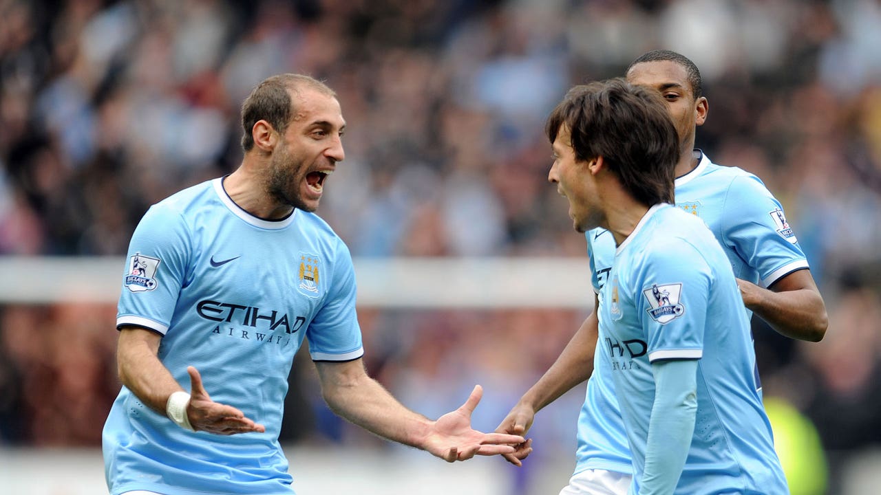 Ten-man Manchester City battle past Hull to forget Barca woes
